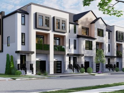 Corner view of stylish light-colored Riverbend Townhomes surrounded by greenery