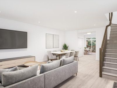 Modern living room and dining space inside a Riverbend Townhome