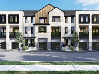 Front-facing view of white-toned Riverbend Townhomes with black framed windows